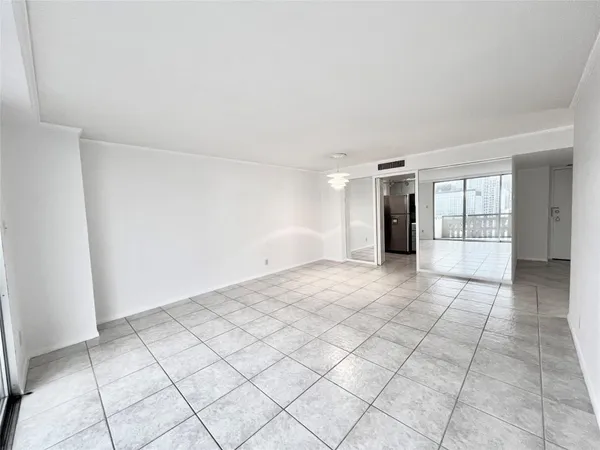 a view of an empty room and window