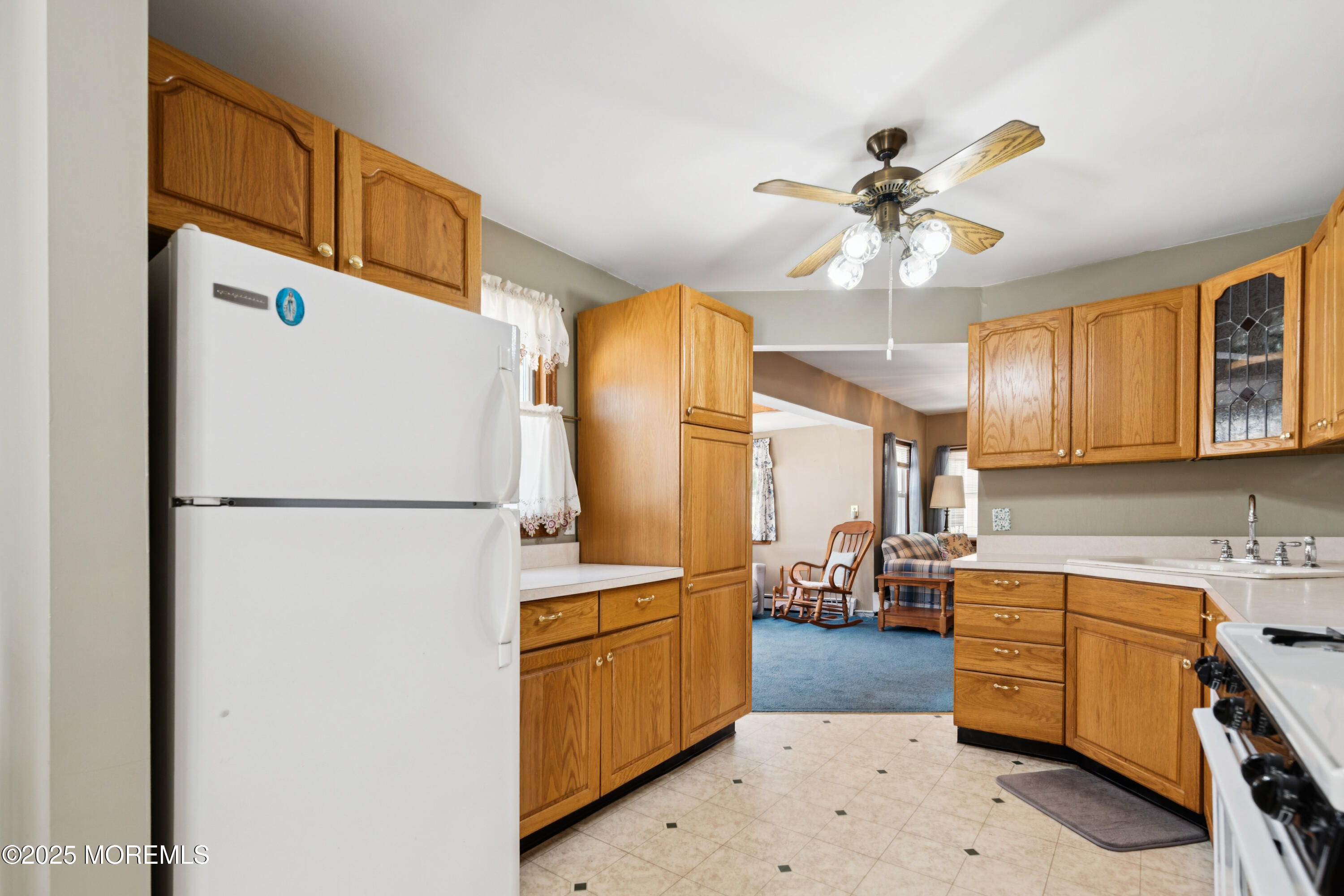 507 Riverside Drive South Brick, NJ 08723 - Photo 12 of 30 a kitchen with refrigerator a stove a sink and dishwasher