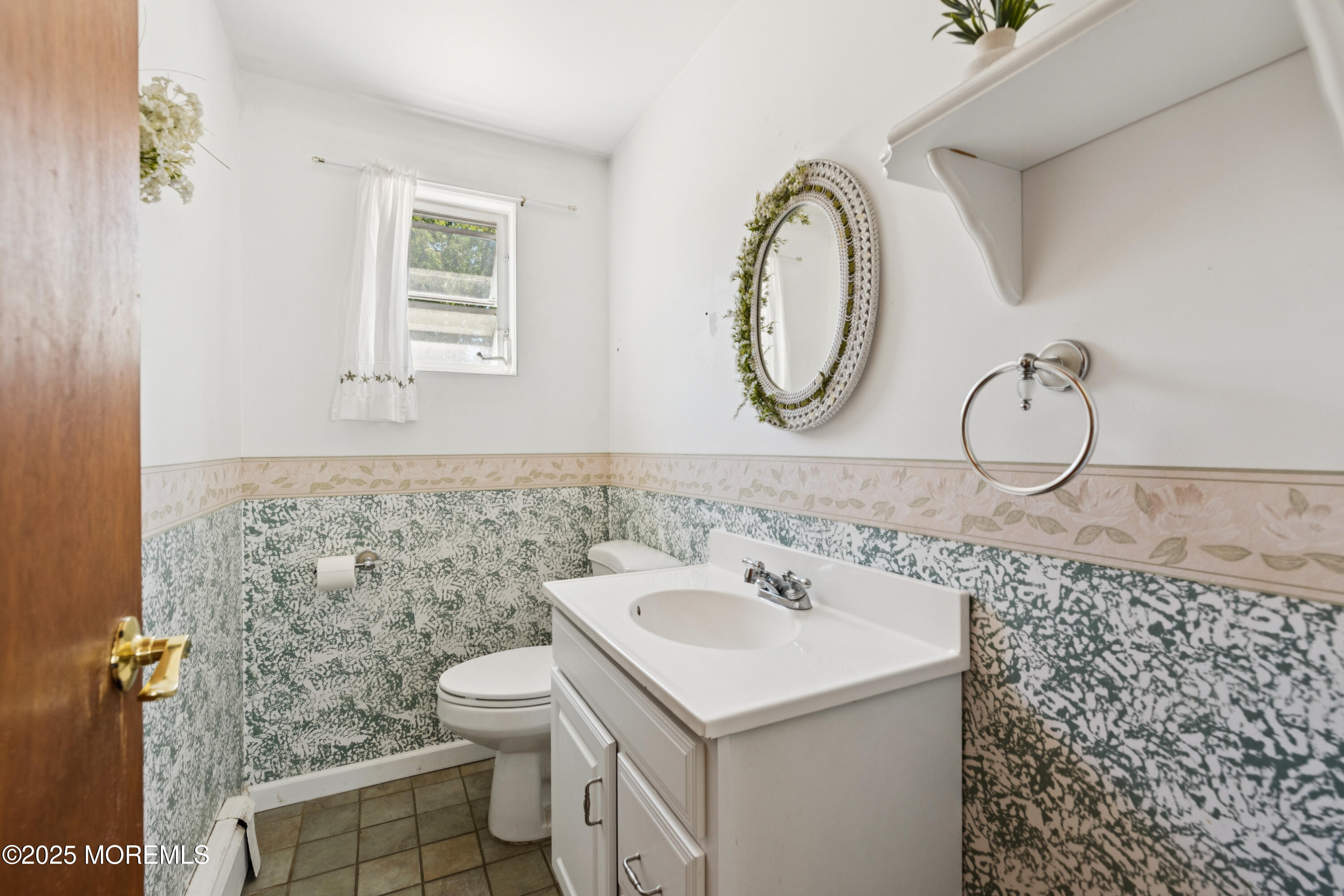 507 Riverside Drive South Brick, NJ 08723 - Photo 16 of 30 a bathroom with a sink and a mirror