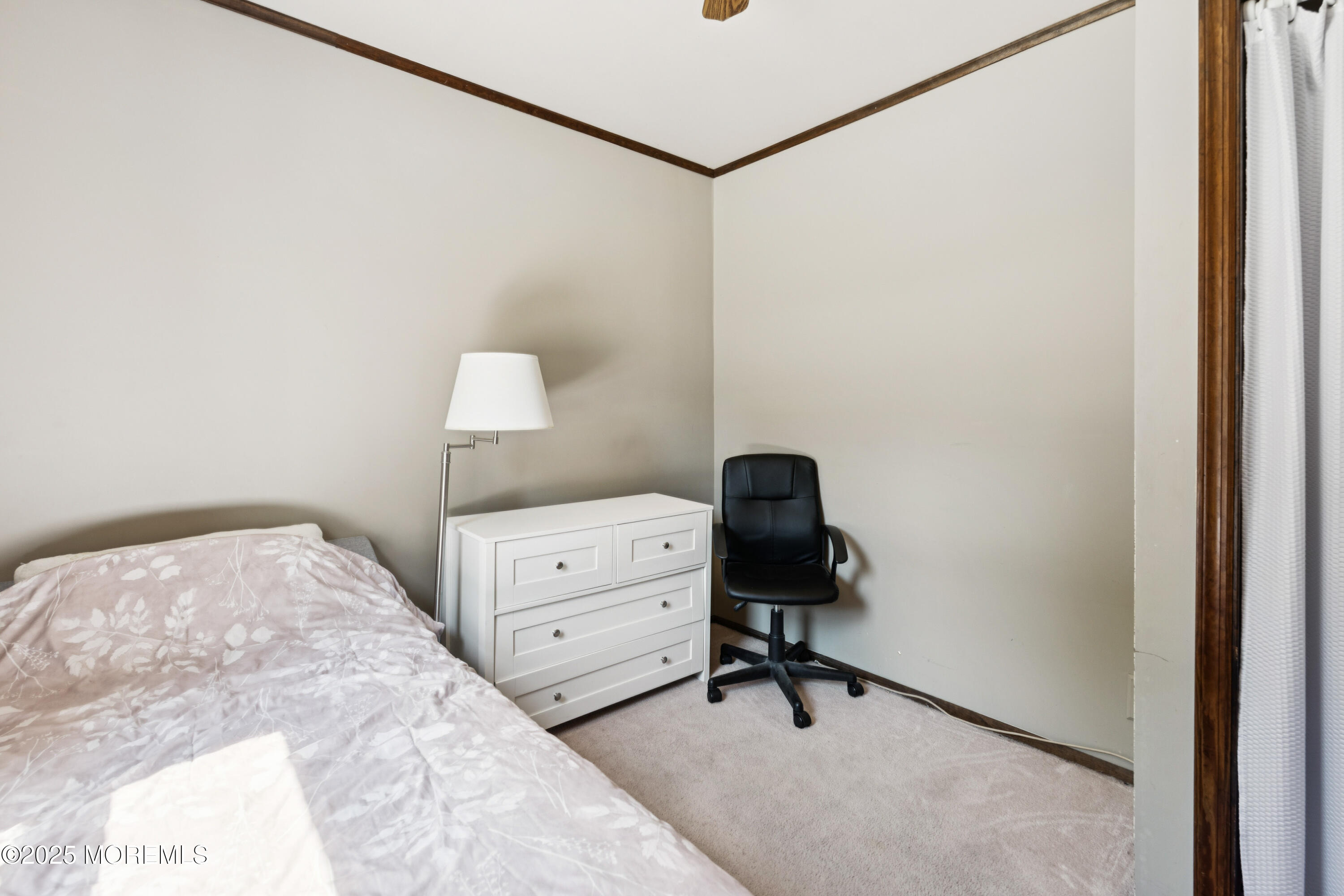 507 Riverside Drive South Brick, NJ 08723 - Photo 21 of 30 a bedroom with a bed and a table in it