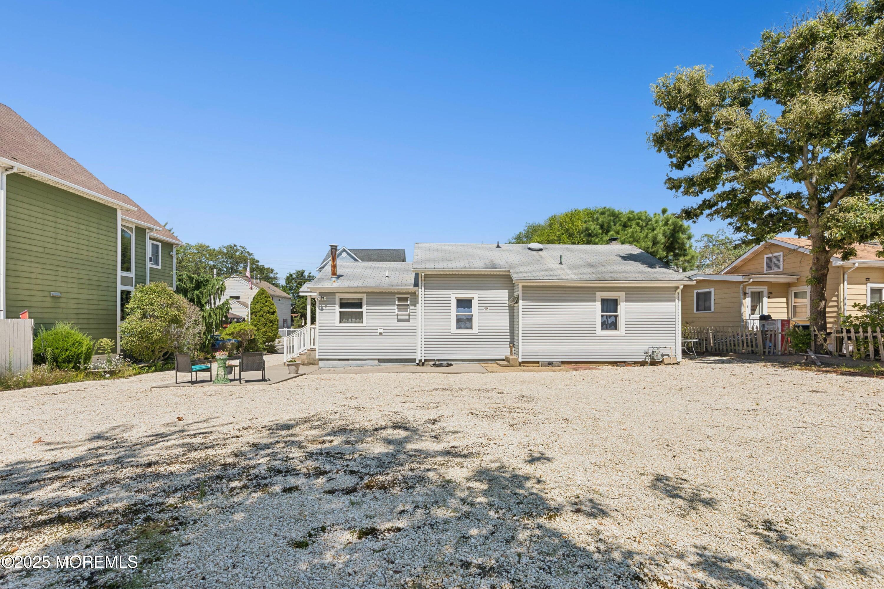 507 Riverside Drive South Brick, NJ 08723 - Photo 26 of 30 a front view of a house with a yard