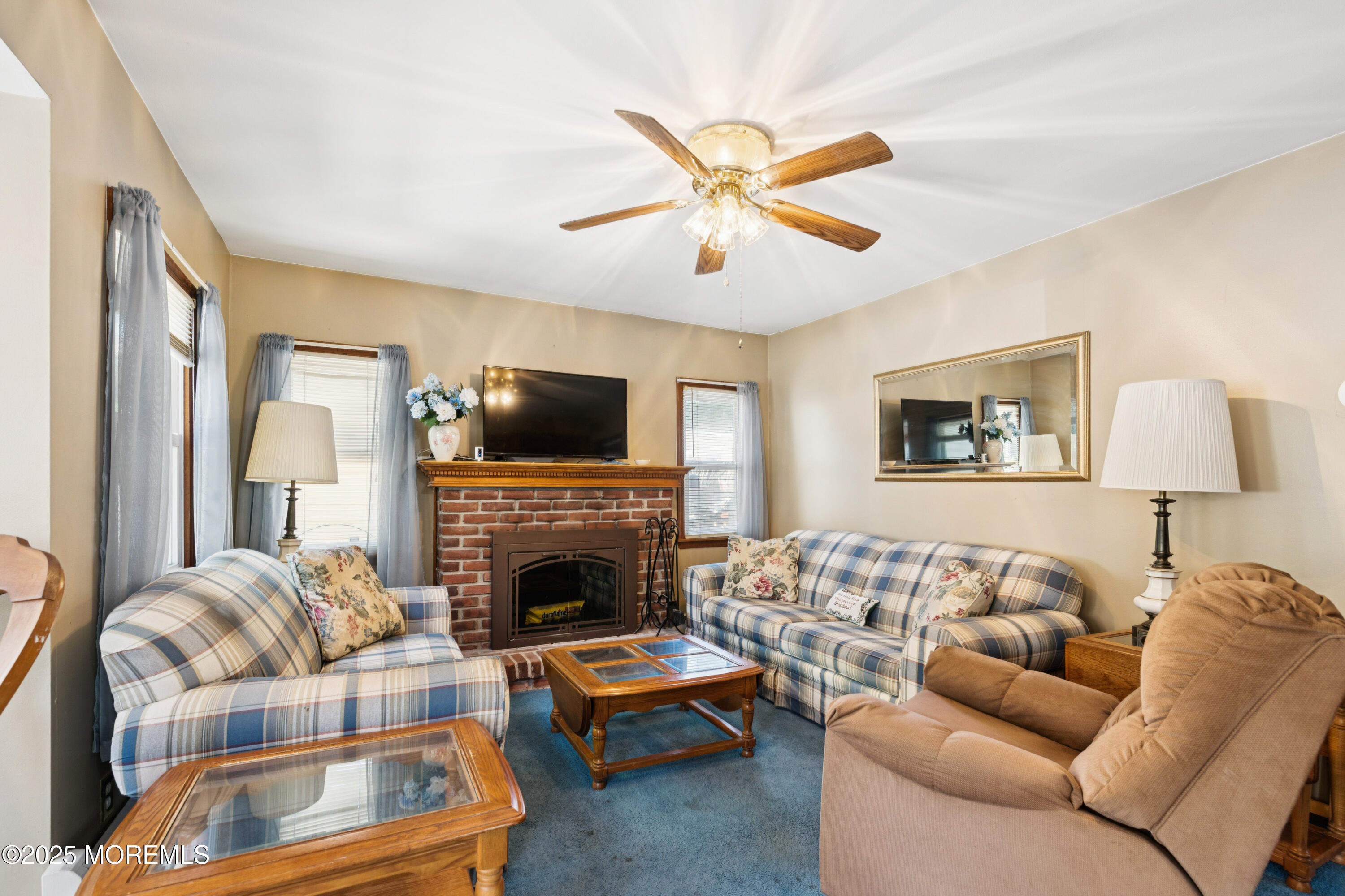 507 Riverside Drive South Brick, NJ 08723 - Photo 6 of 30 a living room with furniture and a fireplace