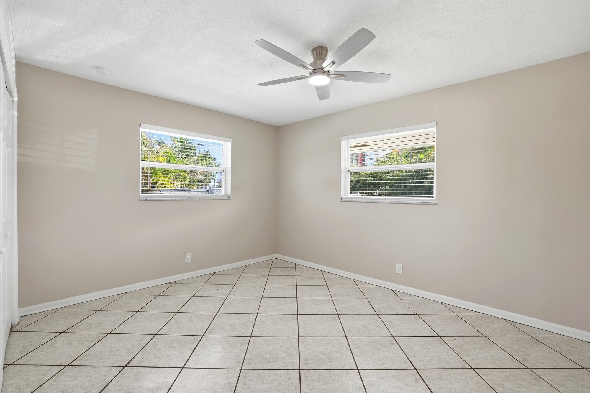 301 Wilma Circle Riviera Beach, FL 33404 - Photo 11 of 35 a view of an empty room with a window