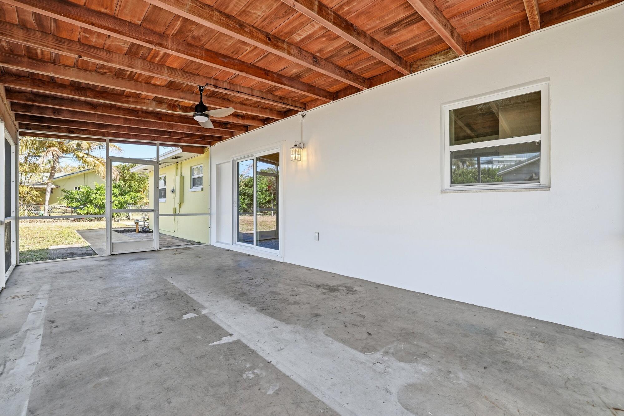 301 Wilma Circle Riviera Beach, FL 33404 - Photo 19 of 35 a view of a room with a large window