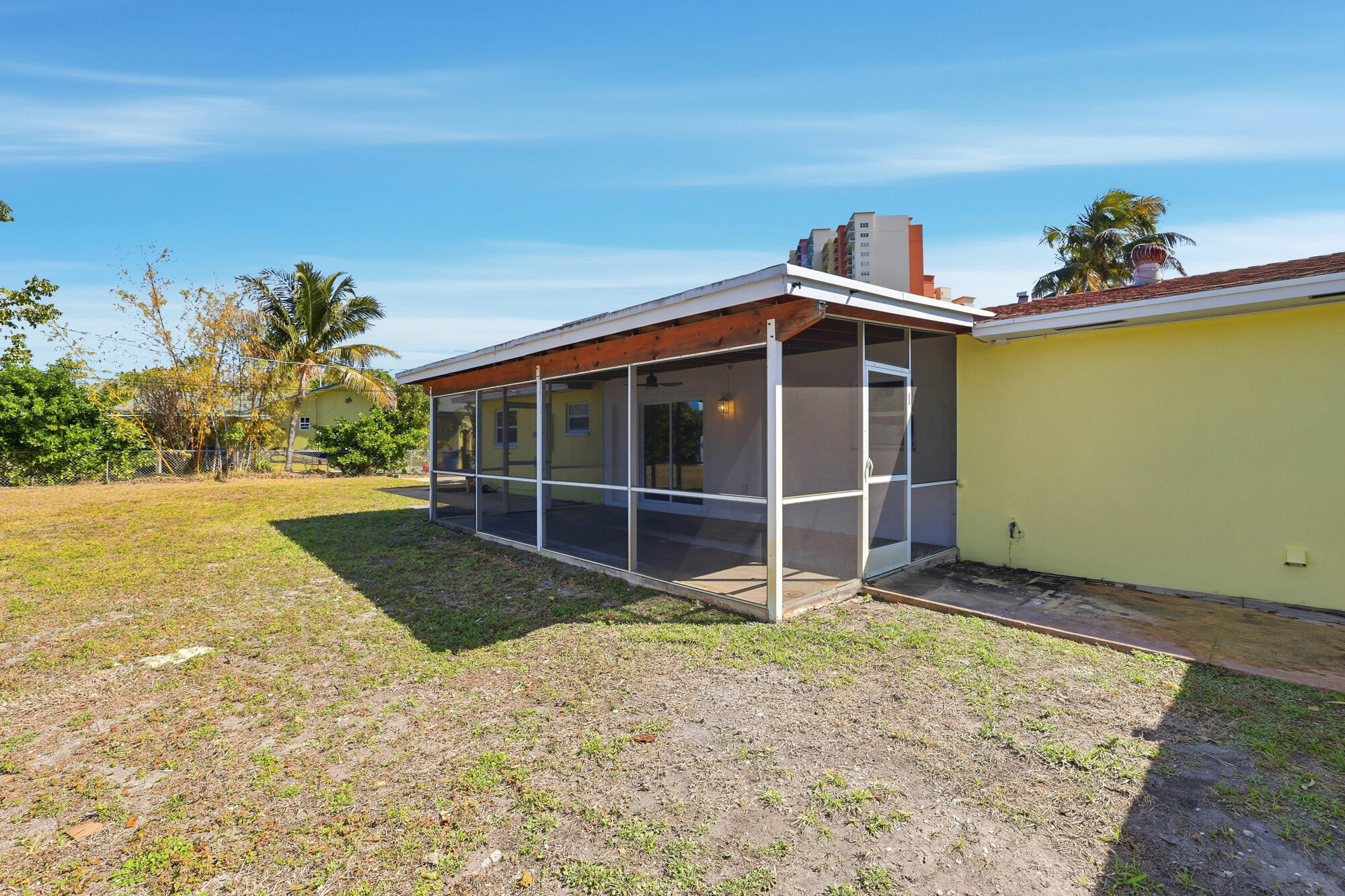 301 Wilma Circle Riviera Beach, FL 33404 - Photo 21 of 35 a front view of a house with a yard