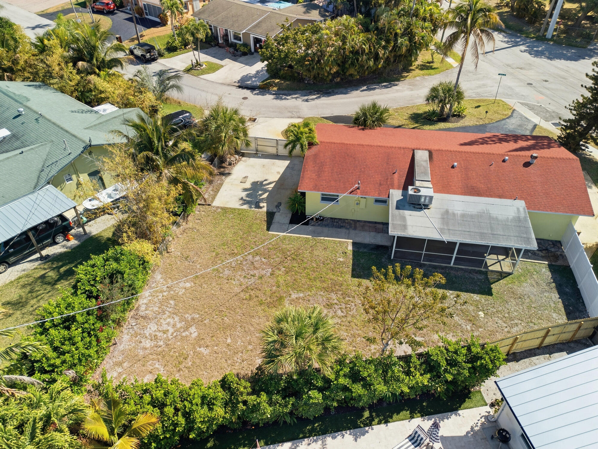 301 Wilma Circle Riviera Beach, FL 33404 - Photo 31 of 35 an aerial view of a house with a yard basket ball court and outdoor seating