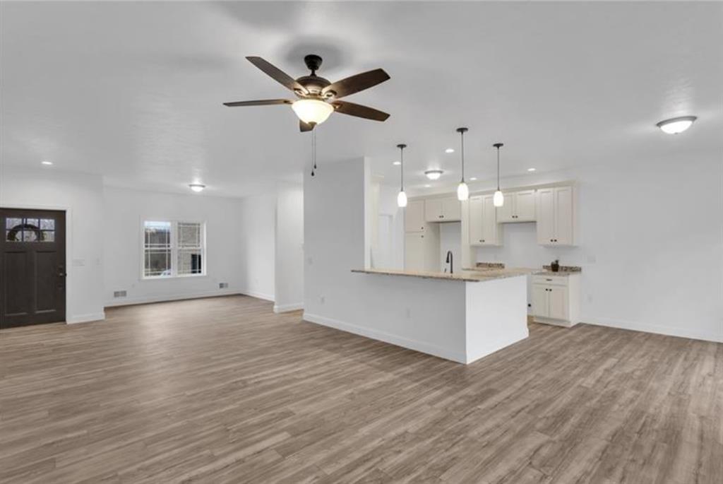 182 Murray Hill Road Tarentum, PA 15084 - Photo 13 of 35 a view of an empty room with kitchen and kitchen view