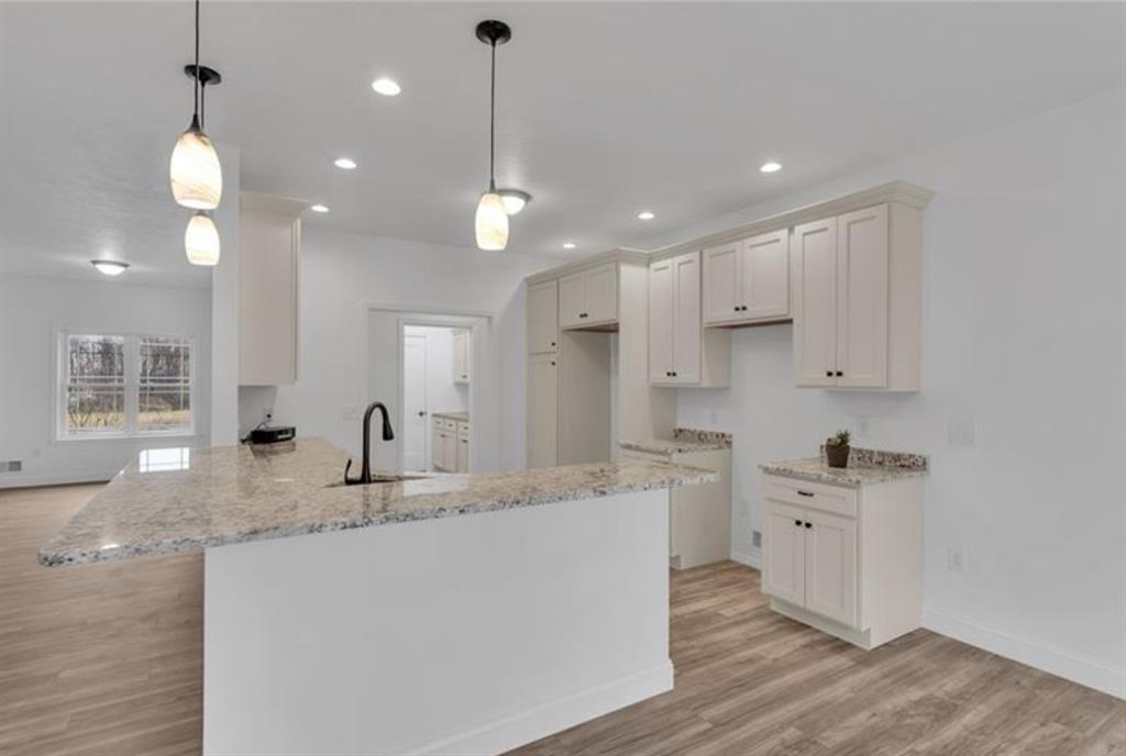 182 Murray Hill Road Tarentum, PA 15084 - Photo 16 of 35 a kitchen with kitchen island a sink stainless steel appliances and cabinets