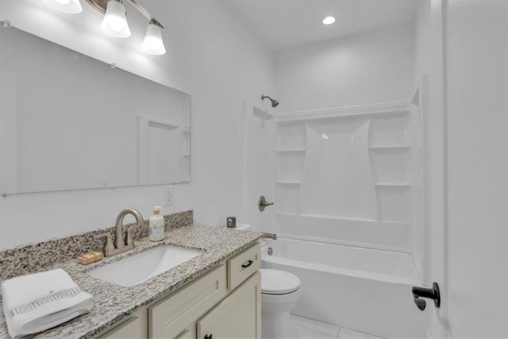 182 Murray Hill Road Tarentum, PA 15084 - Photo 28 of 35 a bathroom with a granite countertop sink toilet and shower