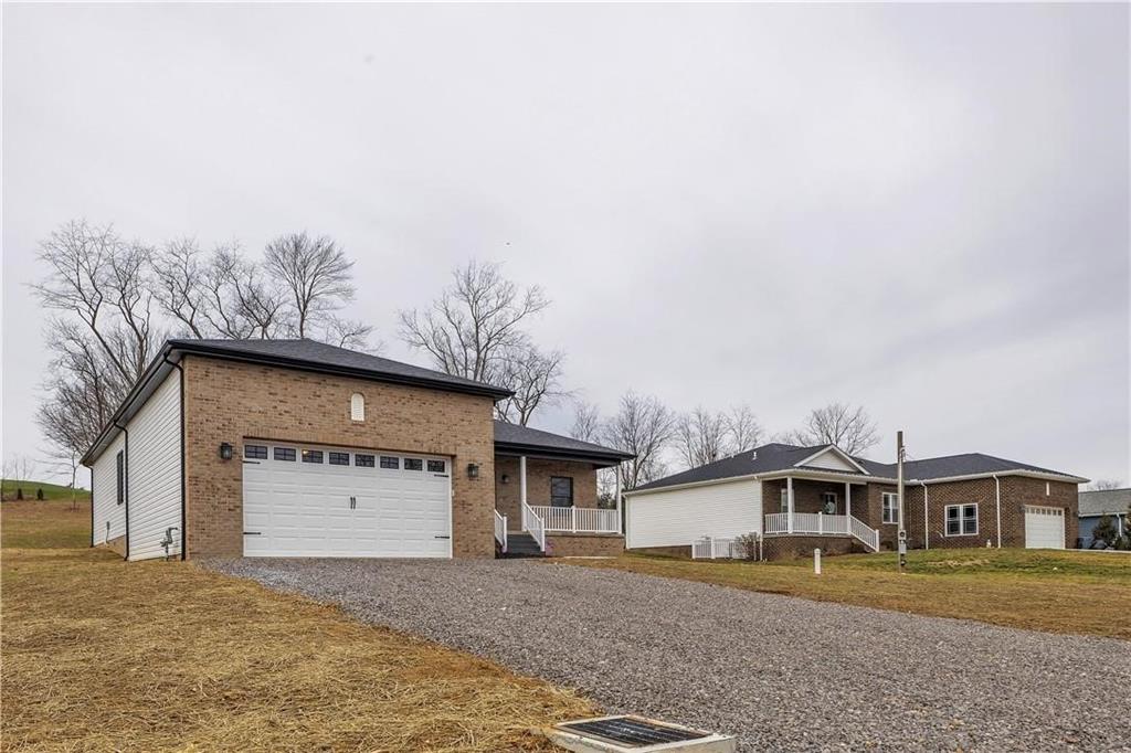 182 Murray Hill Road Tarentum, PA 15084 - Photo 3 of 35 a view of a house with a yard