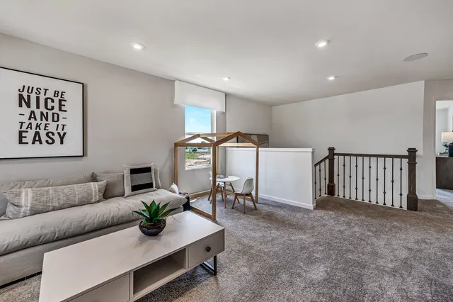a living room with furniture and a couch