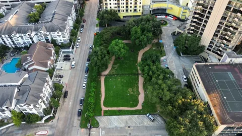an aerial view of a residential houses with outdoor space