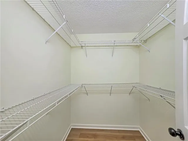 a view of a room with racks on the wall