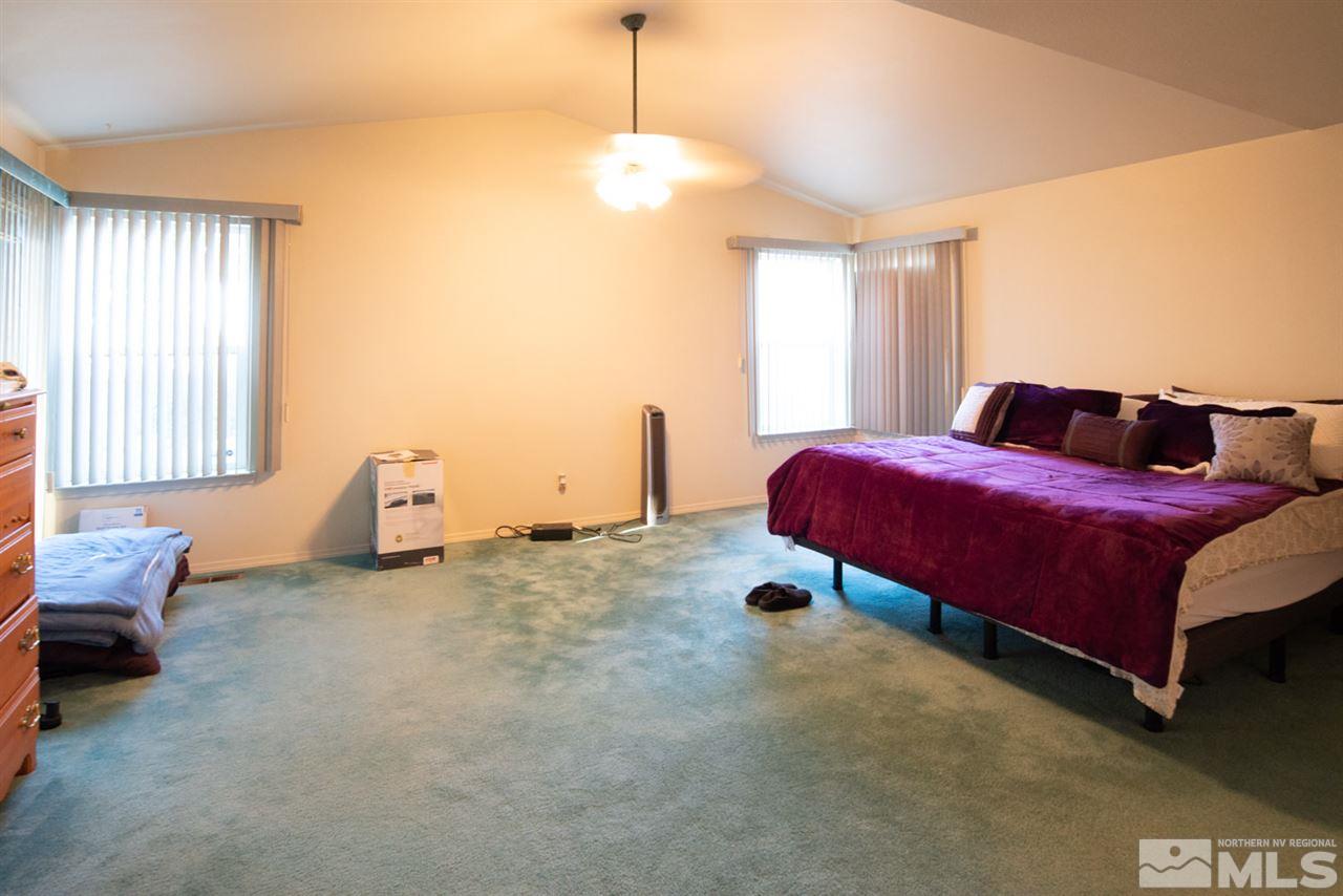 4080 Rancheria Road Fallon, NV 89406 - Photo 18 of 25 a bedroom with a bed and window