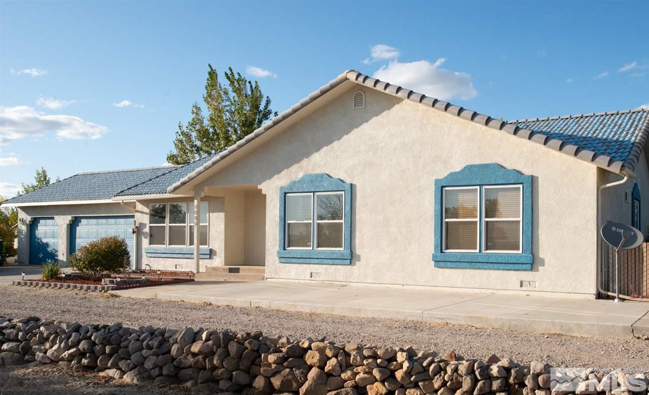 4080 Rancheria Road Fallon, NV 89406 - Photo 2 of 25 a view of a house with a yard