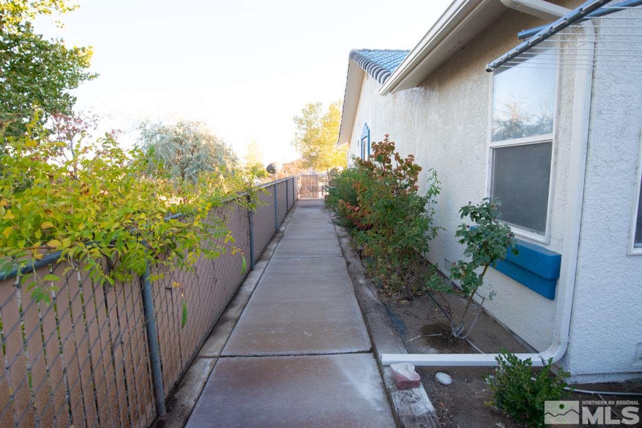 4080 Rancheria Road Fallon, NV 89406 - Photo 22 of 25 a entryway with flower pots