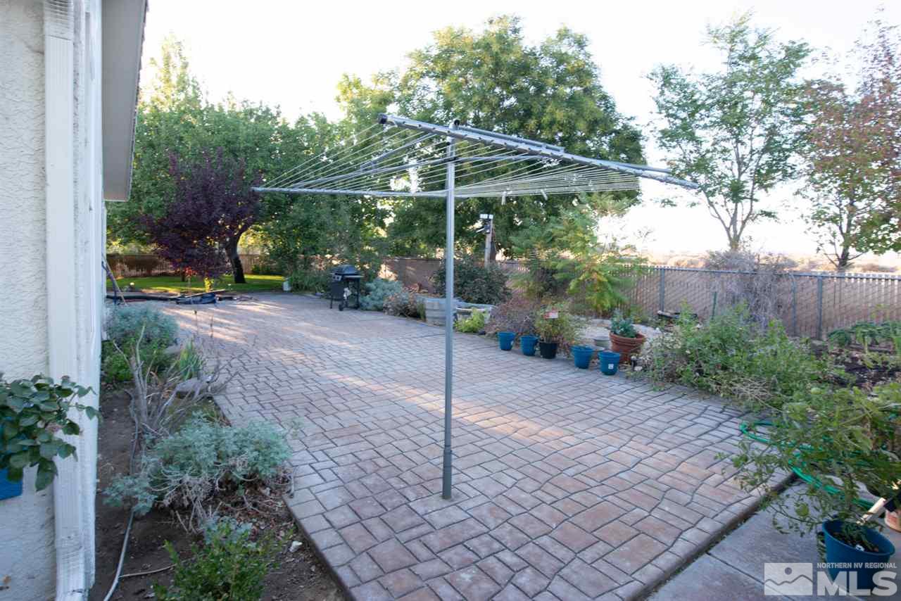 4080 Rancheria Road Fallon, NV 89406 - Photo 23 of 25 a view of a chair and table in the garden
