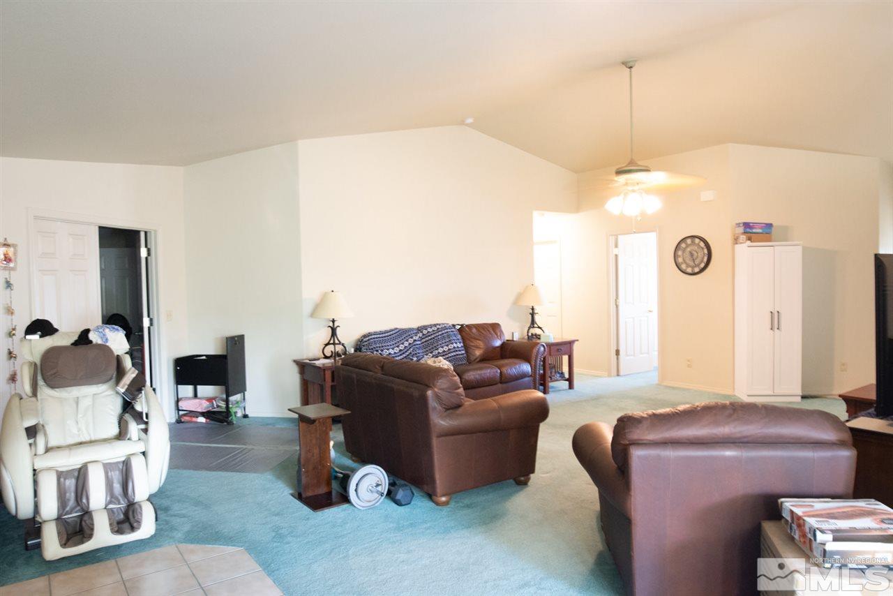 4080 Rancheria Road Fallon, NV 89406 - Photo 7 of 25 a living room with furniture and a flat screen tv