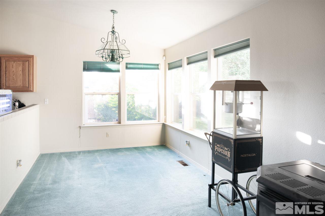 4080 Rancheria Road Fallon, NV 89406 - Photo 8 of 25 a room with a window and dining table