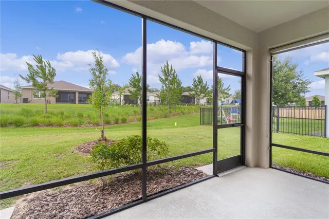 a view of room with window and mountain view