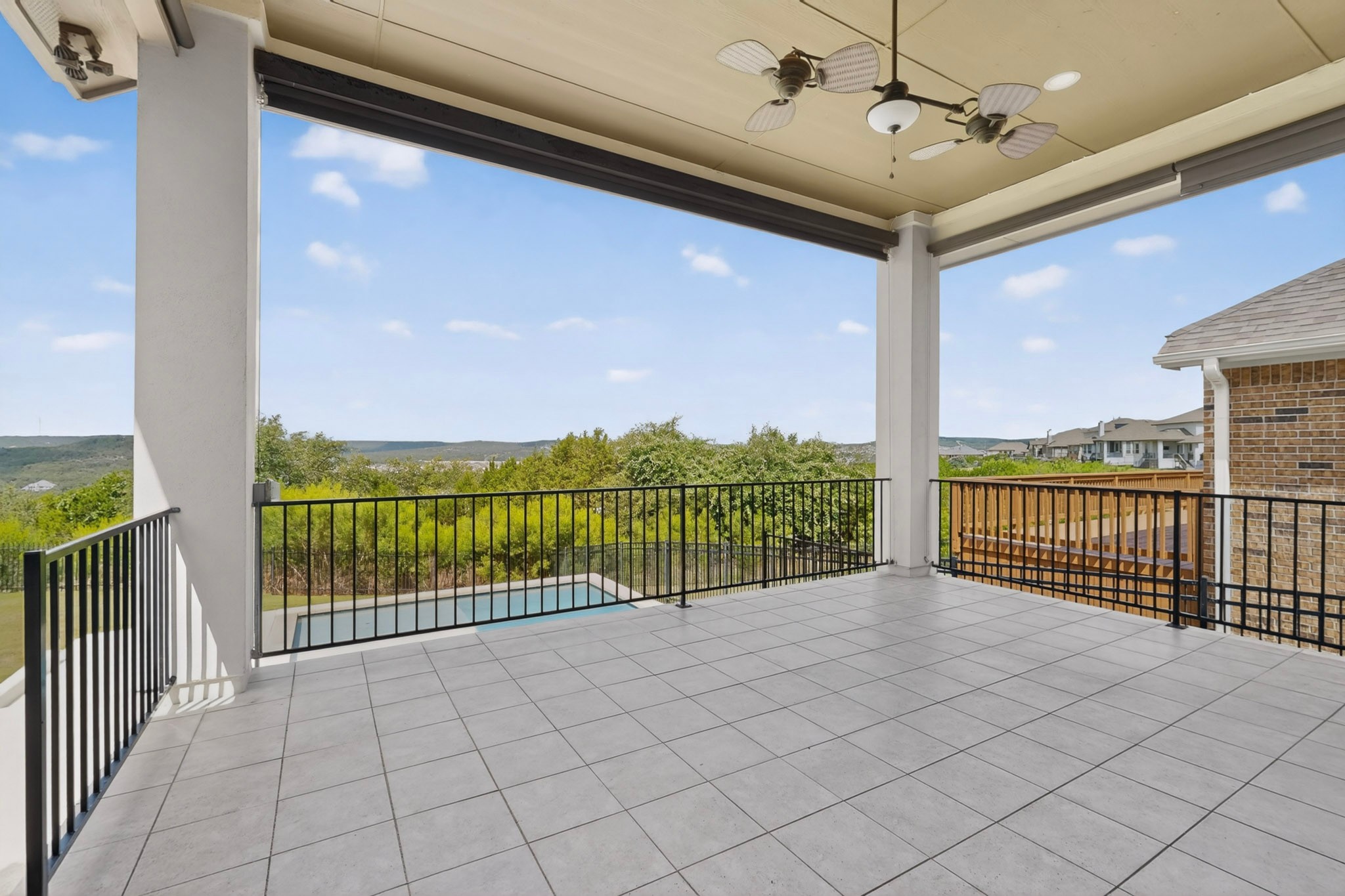 2617 Milan Meadows Drive Leander, TX 78641 - Photo 29 of 40 An inviting covered patio offers panoramic views, perfect for outdoor enjoyment.