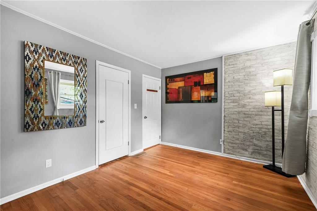 2570 Spring Drive Smyrna, GA 30080 - Photo 24 of 41 a view of empty room with wooden floor and window