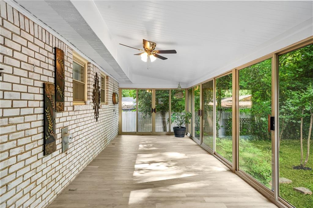 2570 Spring Drive Smyrna, GA 30080 - Photo 31 of 41 a view of a porch with wooden floor and outdoor space