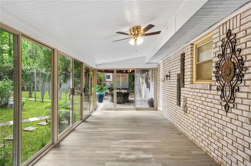 2570 Spring Drive Smyrna, GA 30080 - Photo 32 of 41 a view of a porch with wooden floor and outdoor space