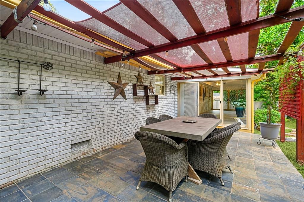 2570 Spring Drive Smyrna, GA 30080 - Photo 34 of 41 a patio with table and chairs