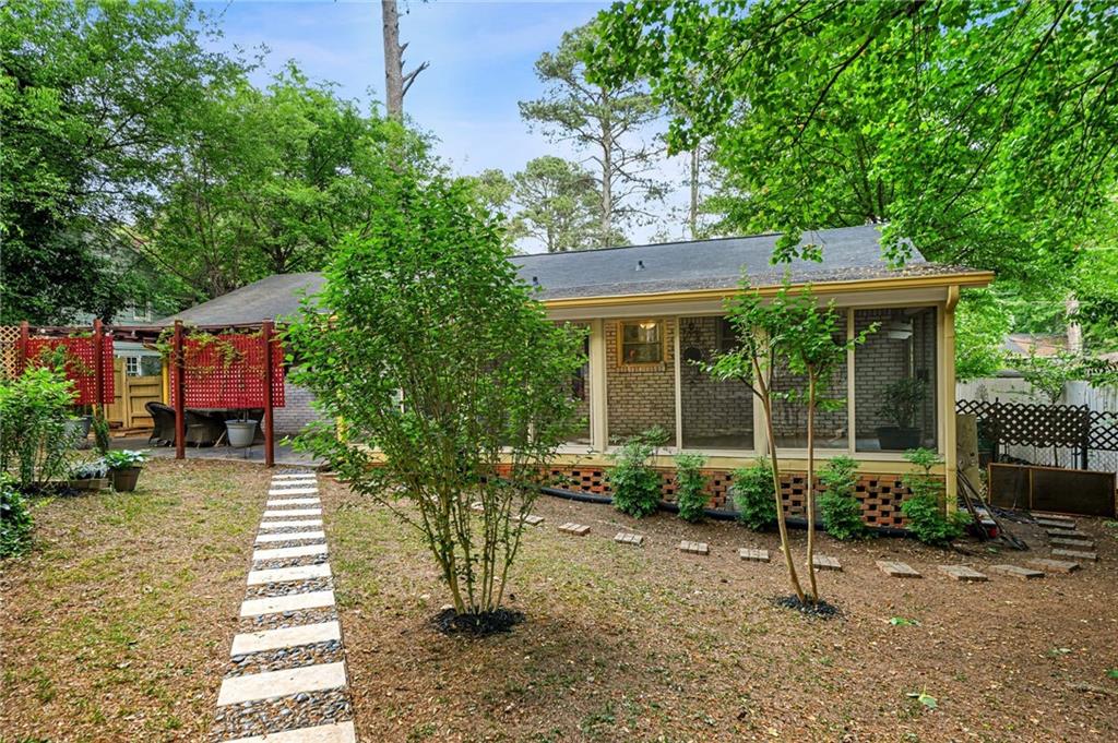 2570 Spring Drive Smyrna, GA 30080 - Photo 40 of 41 a front view of a house with a garden