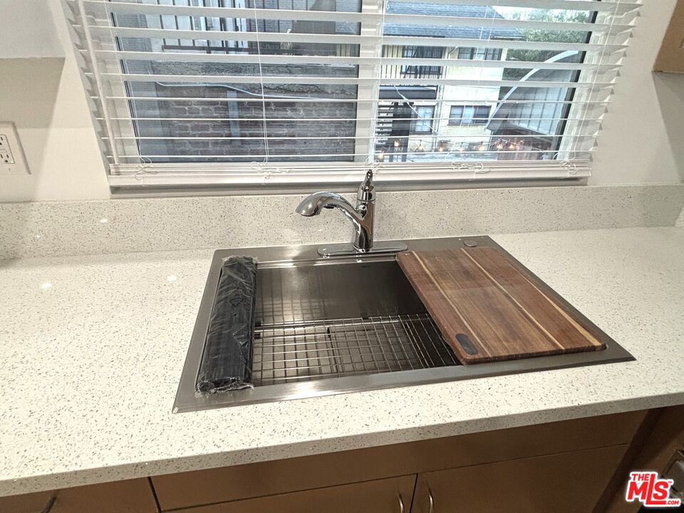 2115 Venice Blvd., Unit 1/2 Los Angeles, CA 90006 - Photo 5 of 14 a kitchen with a sink and a window