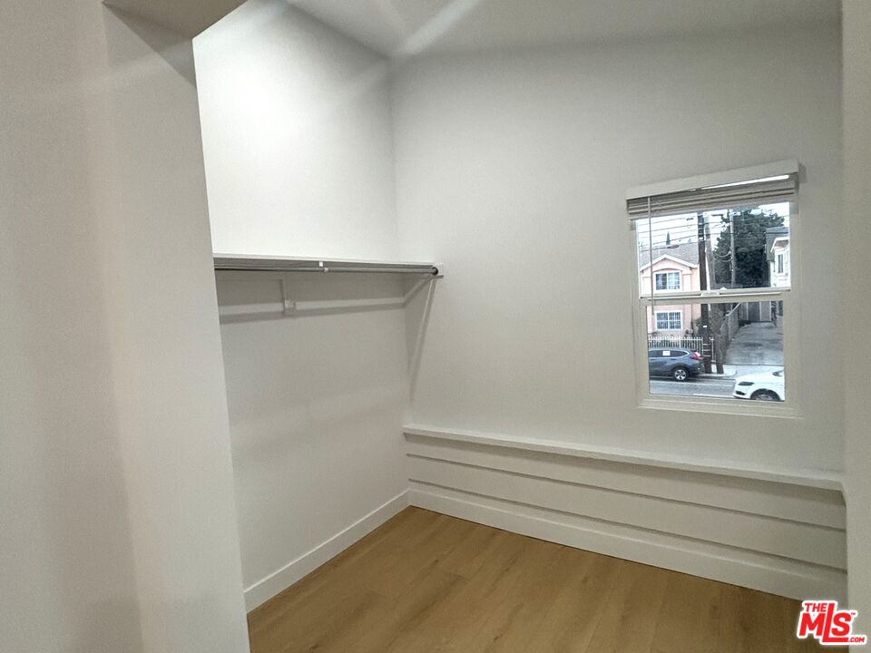 2115 Venice Blvd., Unit 1/2 Los Angeles, CA 90006 - Photo 8 of 14 a view of small space with racks on the wall