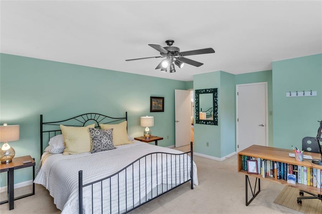 369 Maple Lane Canonsburg, PA 15317 - Photo 35 of 50 a bedroom with a bed and a chandelier