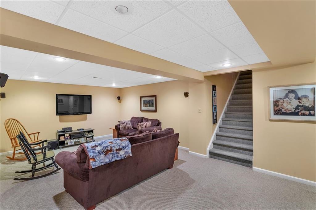 369 Maple Lane Canonsburg, PA 15317 - Photo 37 of 50 a living room with furniture and a flat screen tv