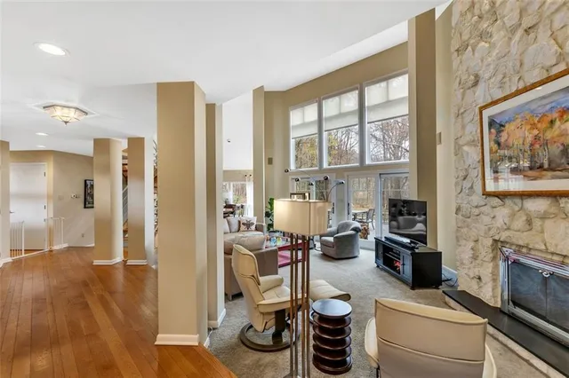 a room with furniture and a fireplace