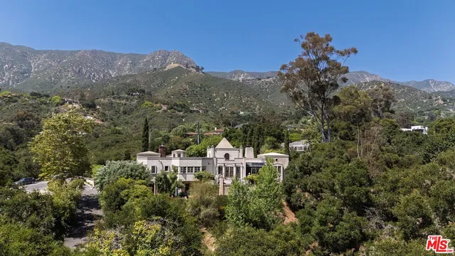a view of a city with a mountain