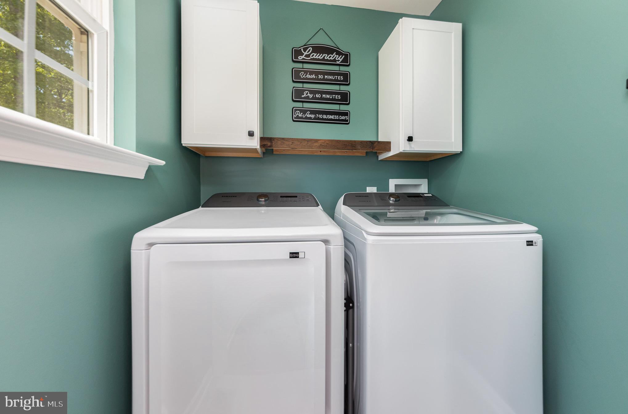 7464 Cedar Fork Road Ruther Glen, VA 22546 - Photo 19 of 24 a utility room with dryer and washer