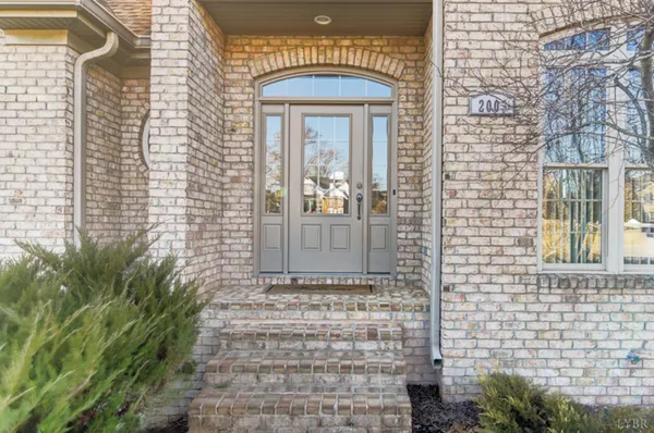 a front view of a house with a glass door