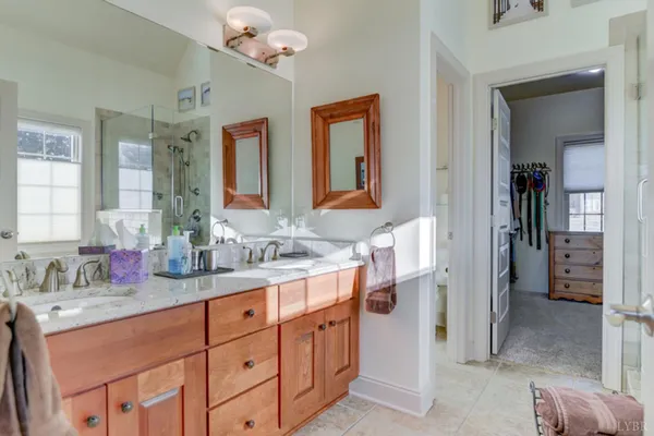 a view of a workspace with furniture and wooden floor
