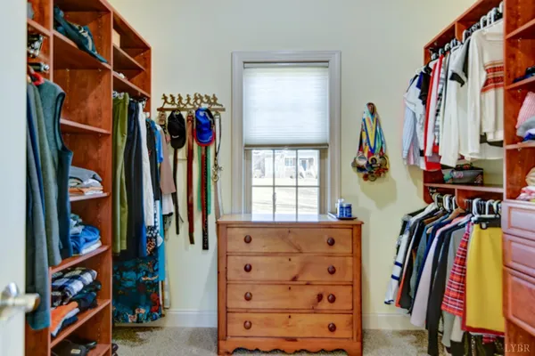 a view of a livingroom with furniture and window