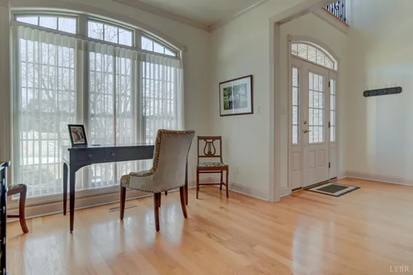 a large kitchen with kitchen island a sink stainless steel appliances and cabinets
