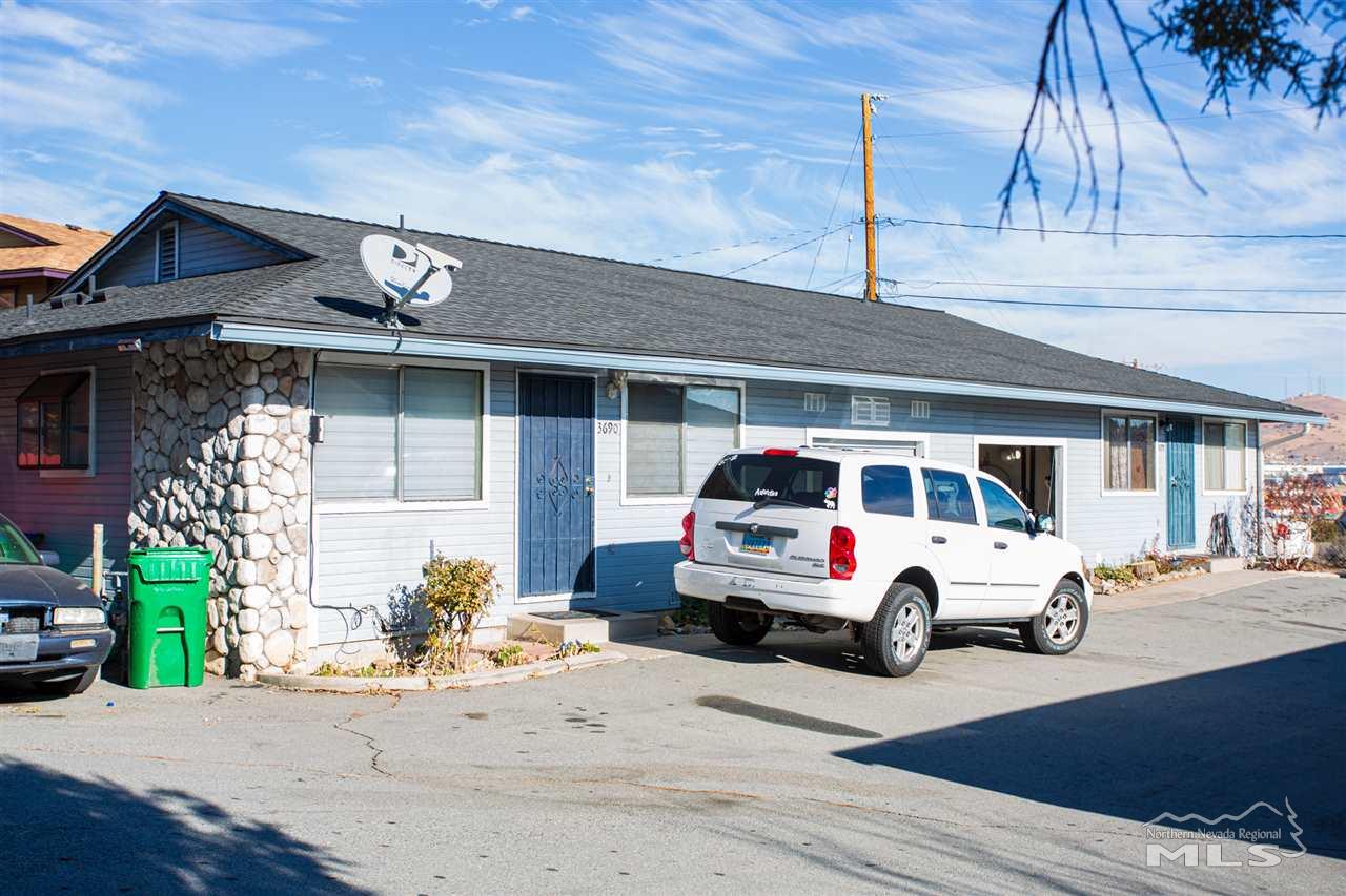 3670 Gypsum Road Reno, NV 89503 - Photo 2 of 29 a car parked in front of white building