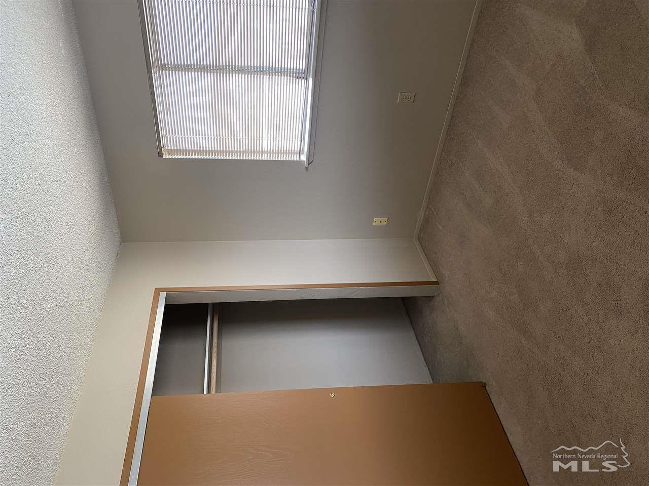 3670 Gypsum Road Reno, NV 89503 - Photo 11 of 29 an empty room with windows and closet