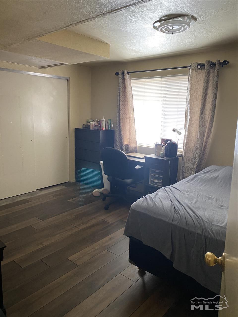 3670 Gypsum Road Reno, NV 89503 - Photo 20 of 29 a bedroom with a bed and window