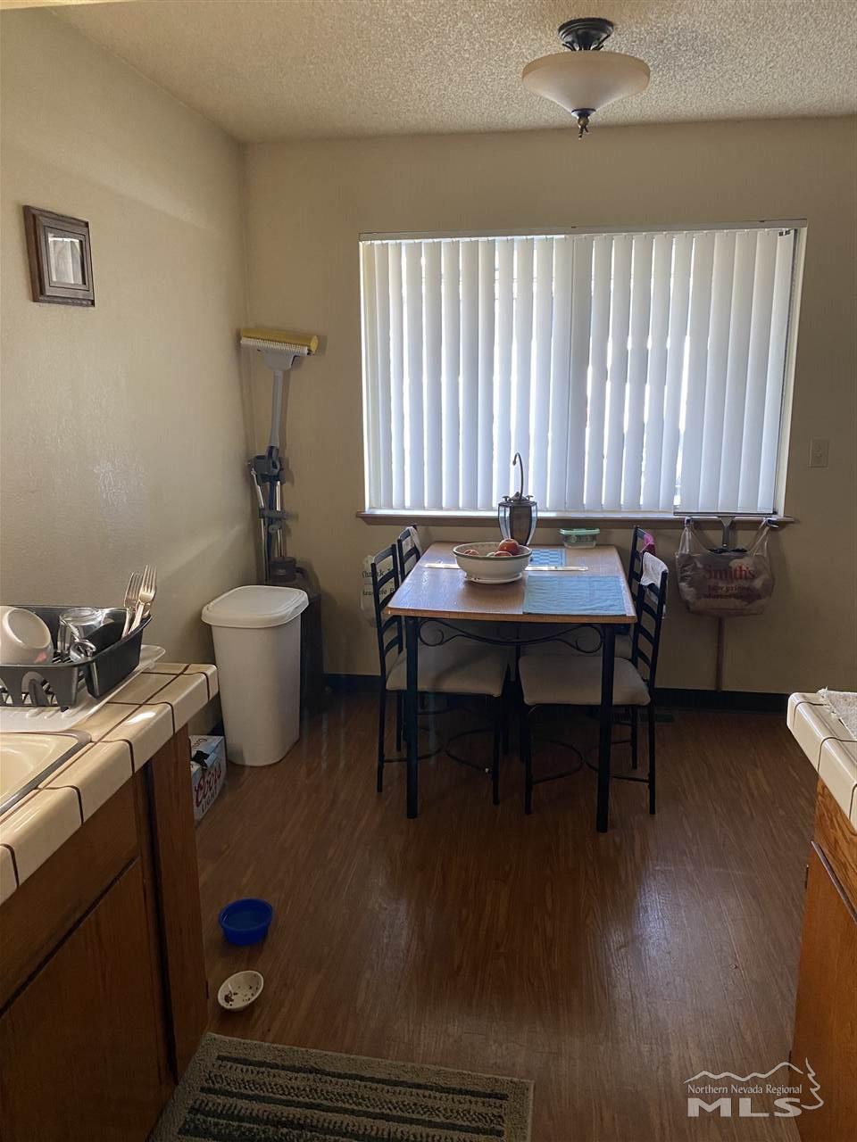 3670 Gypsum Road Reno, NV 89503 - Photo 22 of 29 a view of a workspace with furniture and a window