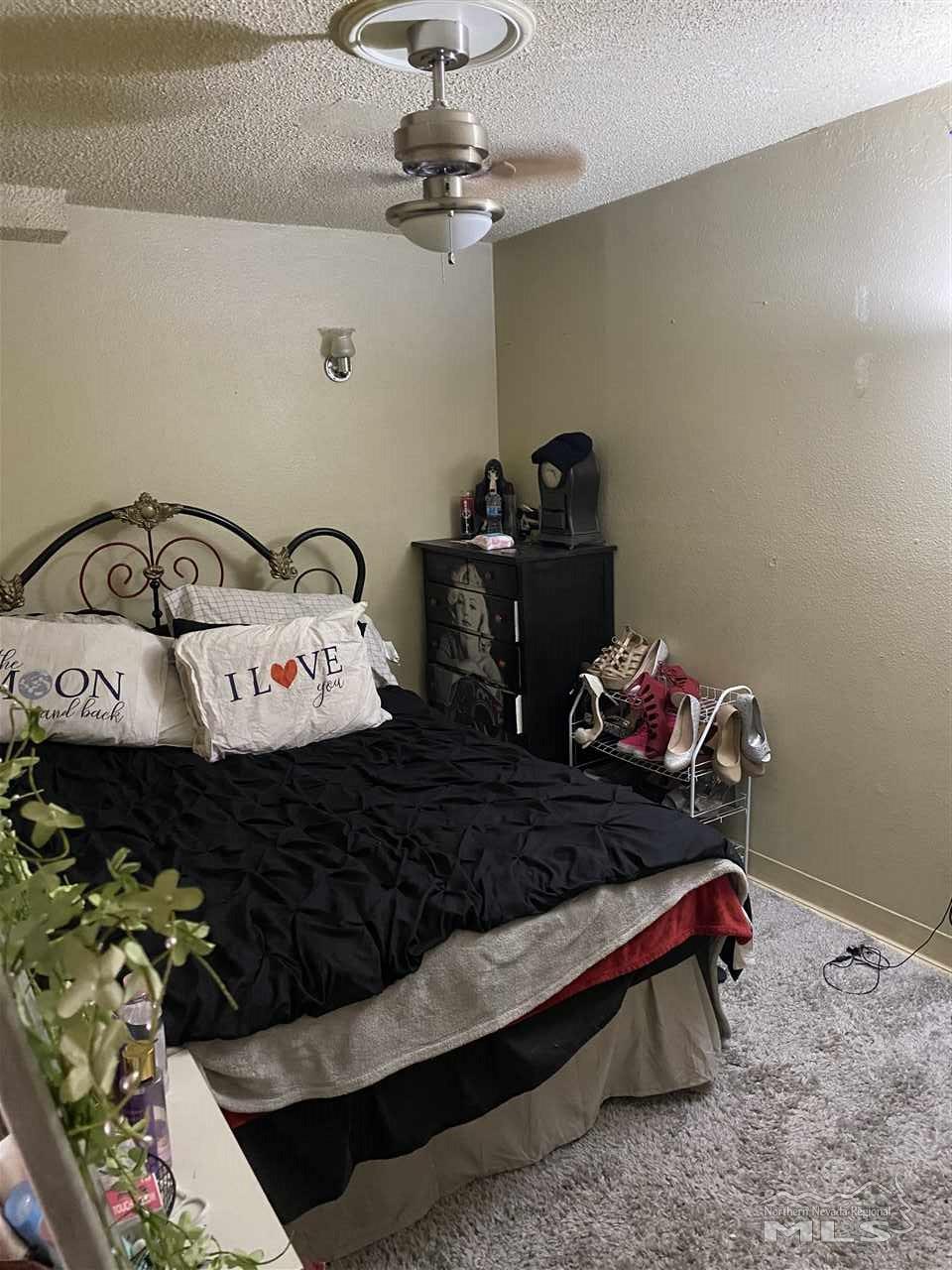 3670 Gypsum Road Reno, NV 89503 - Photo 28 of 29 a bed sitting in a bedroom next to a window