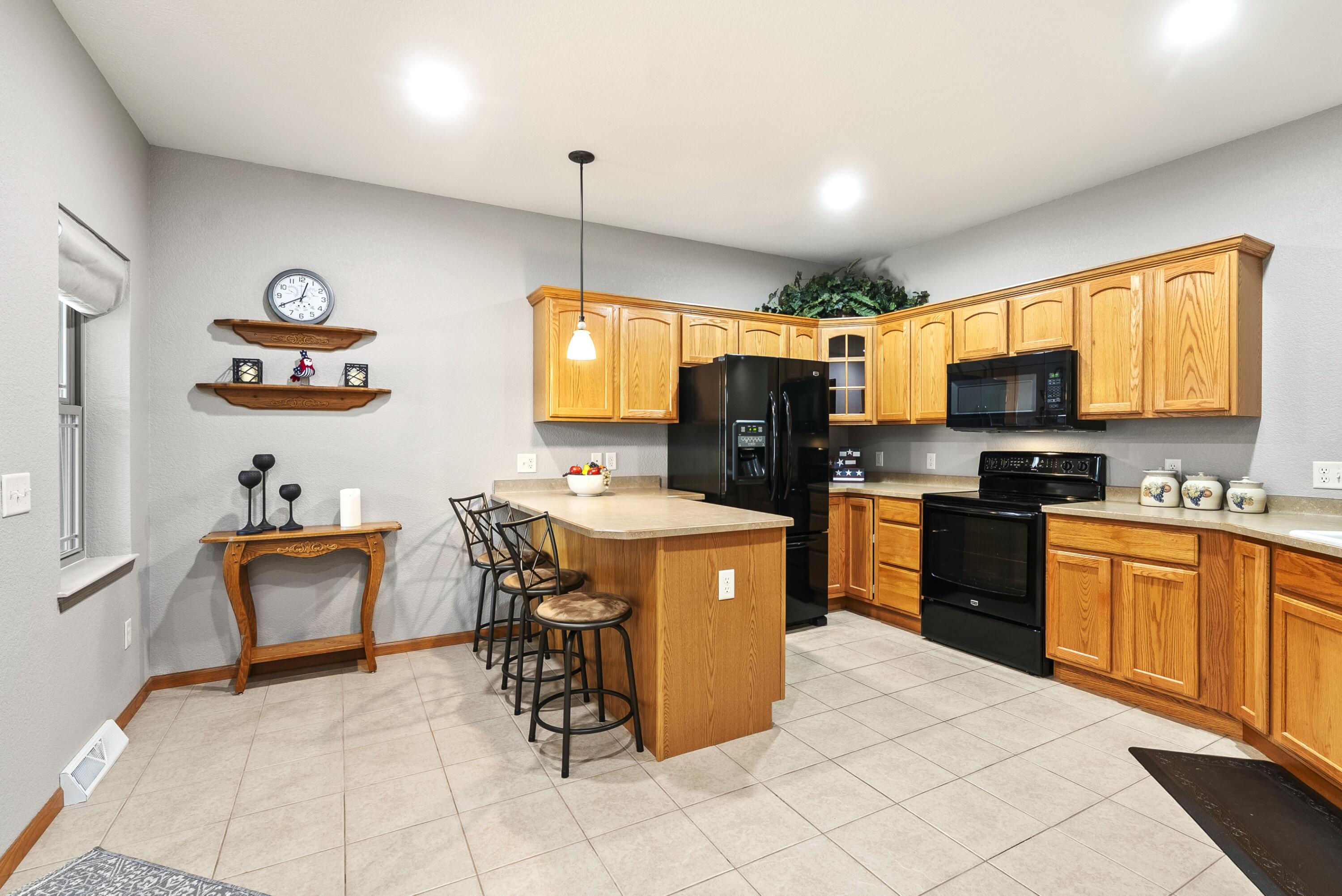 113 Community Drive Fall River, WI 53932 - Photo 5 of 40 Ample Cabinetry