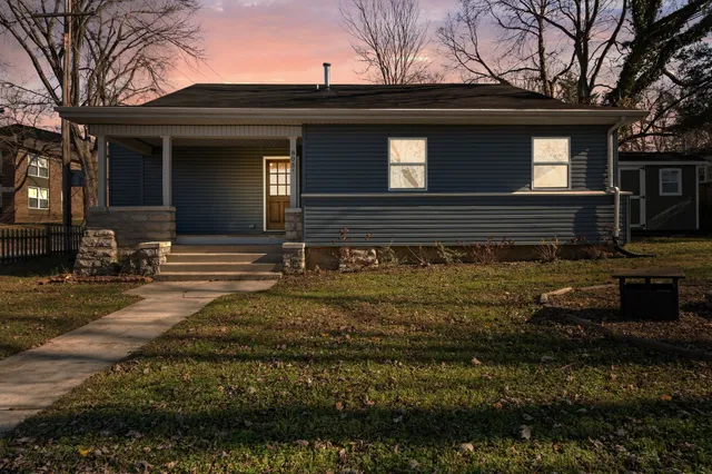 a front view of house with yard