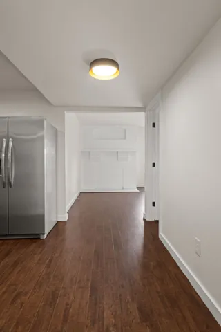 a kitchen with stainless steel appliances granite countertop a refrigerator sink and cabinets