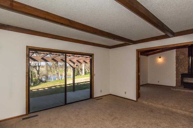 9056 Silver Bridge Road Palo Cedro, CA 96073 - Photo 13 of 29 Living Room Towards Back Patio